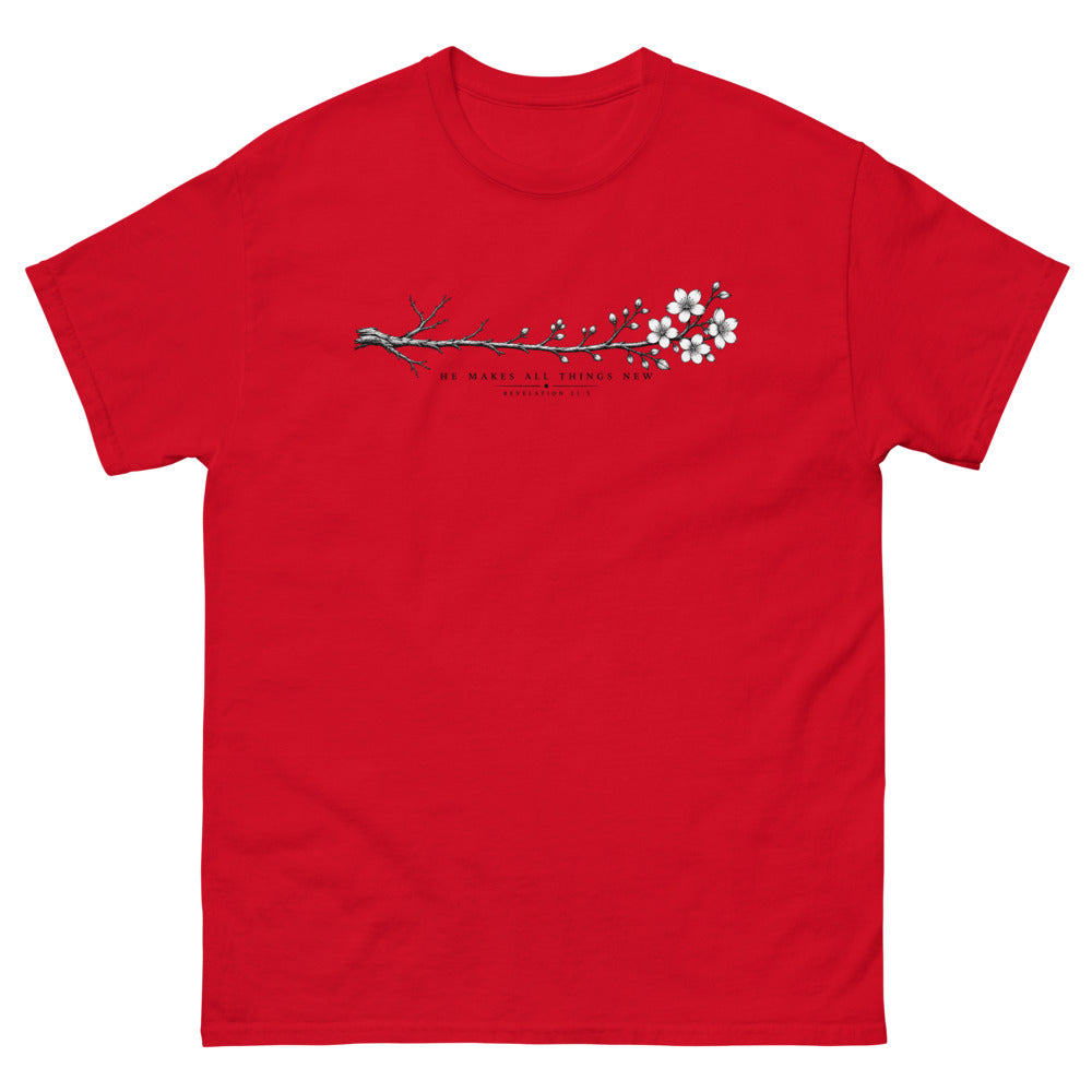 Line art branch flowering from bare to bloom with the words He Makes All Things New on a Red shirt
