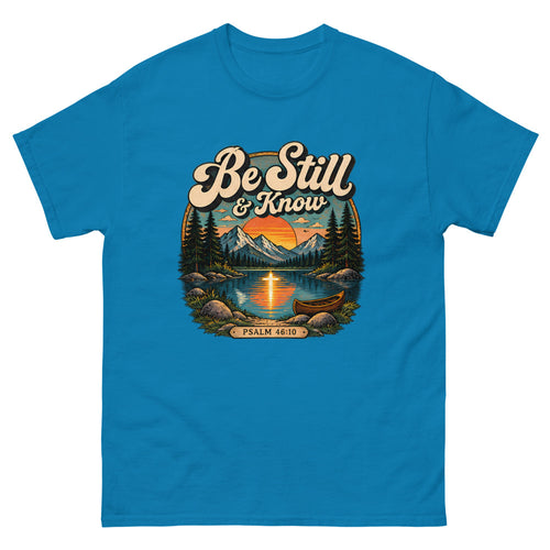 Retro lake and canoe scene at sunset reading Be Still And Know on a Sapphire shirt