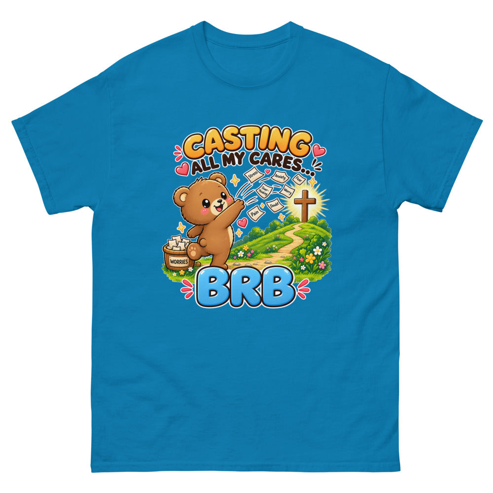 Cartoon bear throwing worry notes away with the words Casting All My Cares BRB on a Sapphire shirt