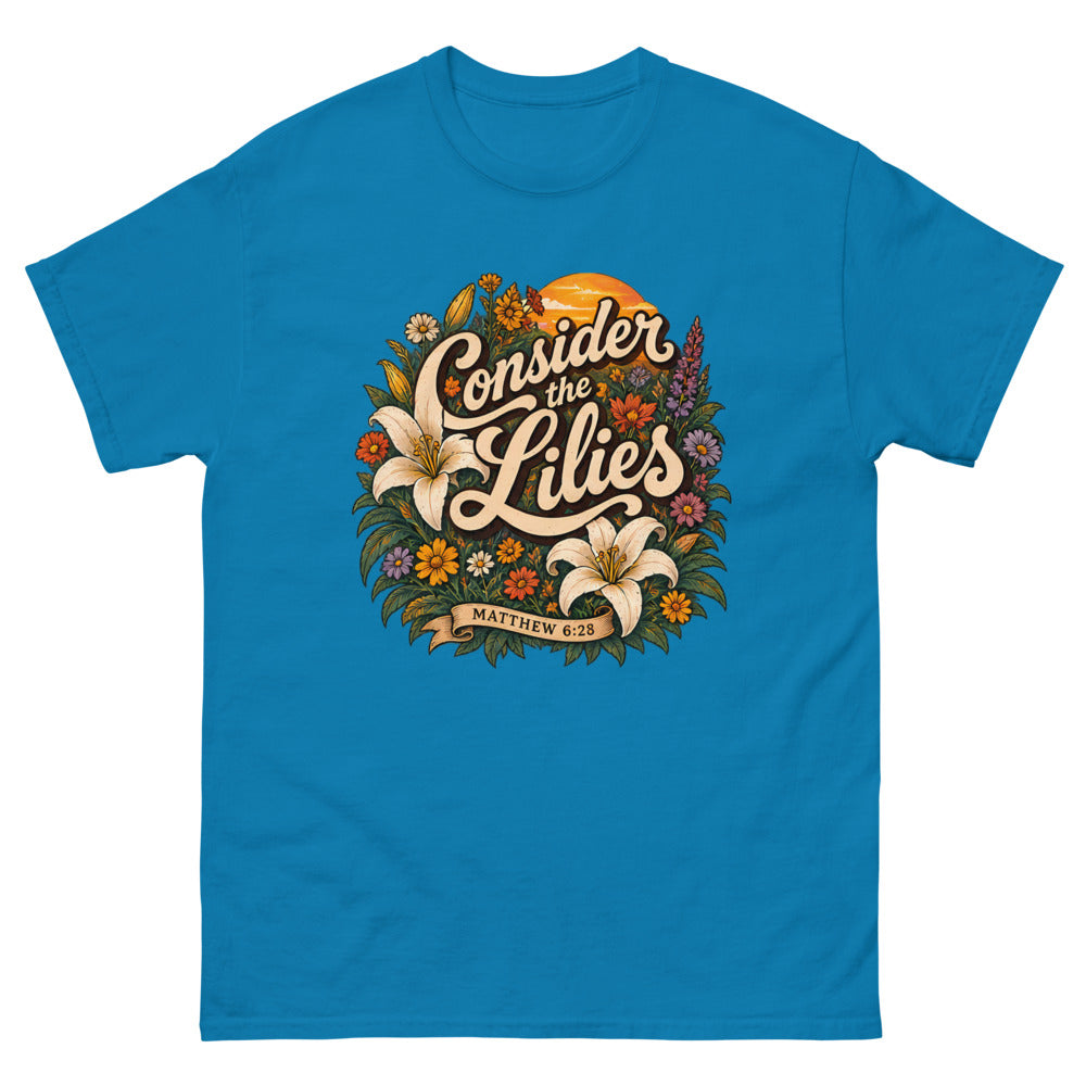 Retro floral illustration with lilies reading Consider The Lilies on a Sapphire shirt