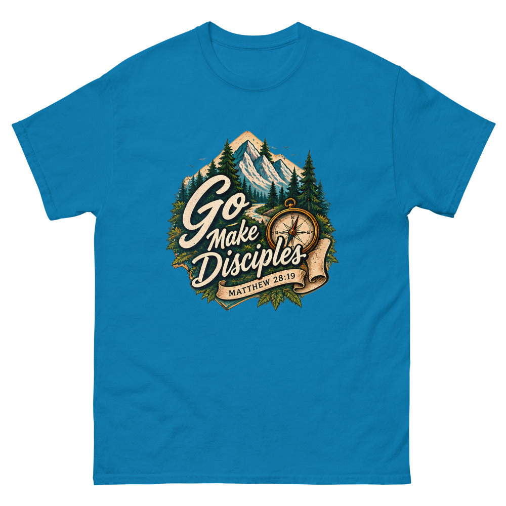 Compass over a mountain trail badge reading Go Make Disciples on a Sapphire shirt