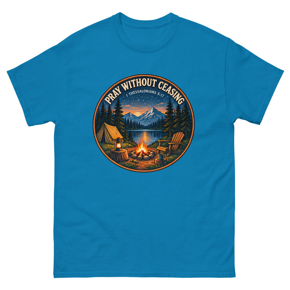 Round campfire and tent badge at night reading Pray Without Ceasing on a Sapphire shirt