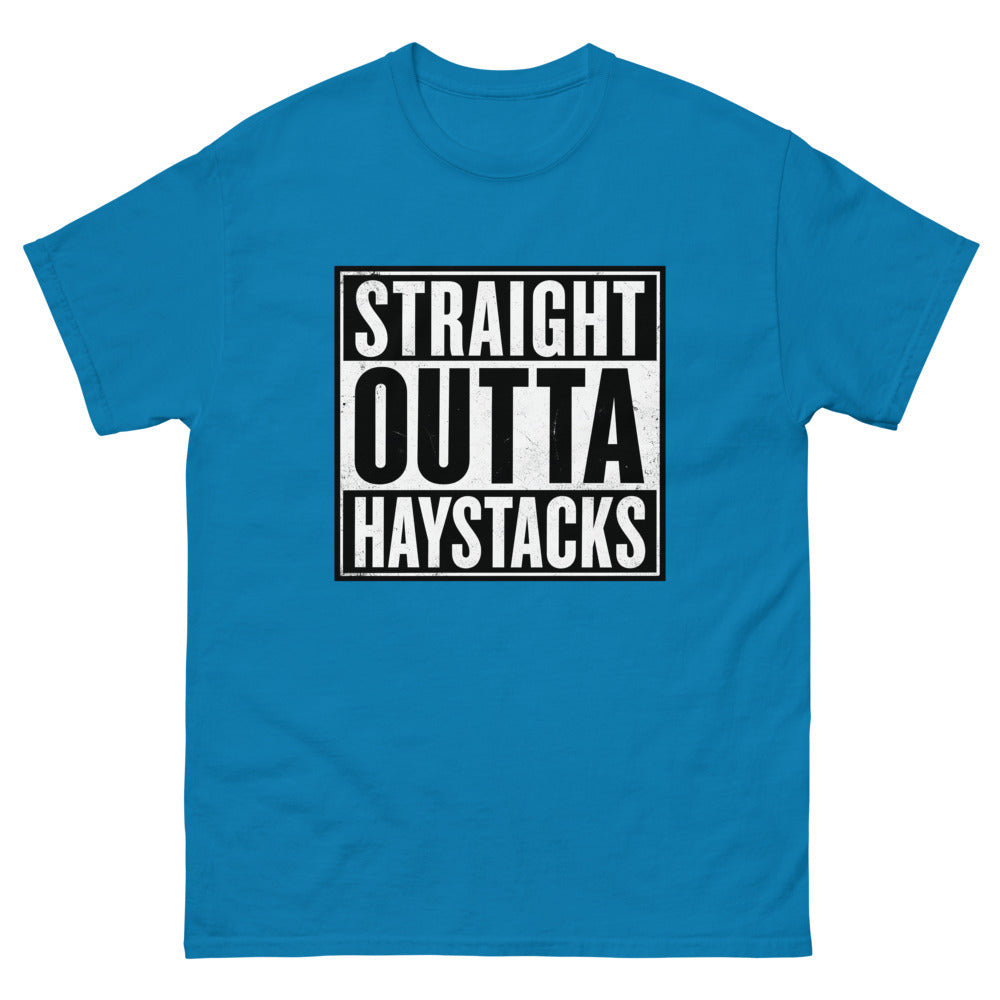 Distressed block lettering reading Straight Outta Haystacks on a Sapphire shirt