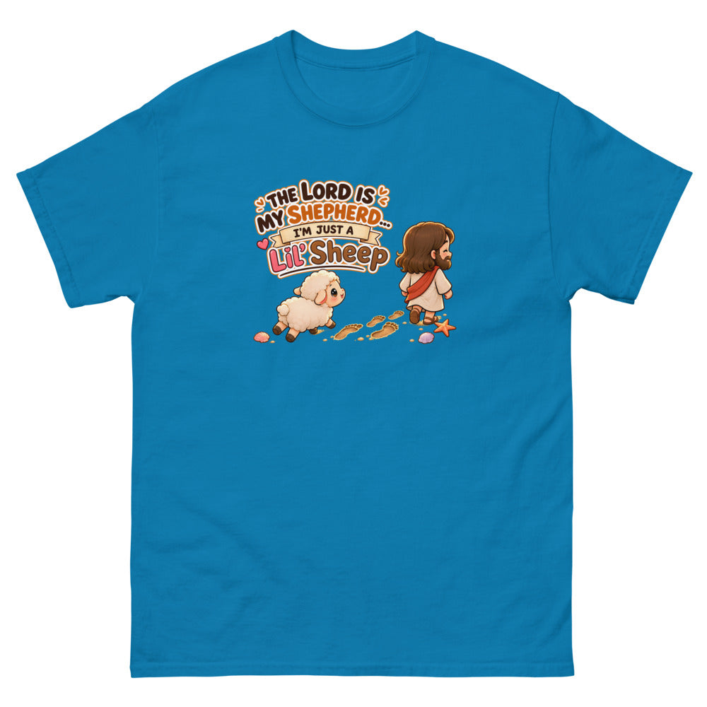 Chibi Jesus walking ahead of a little sheep with the words The Lord Is My Shepherd I'm Just A Lil Sheep on a Sapphire shirt