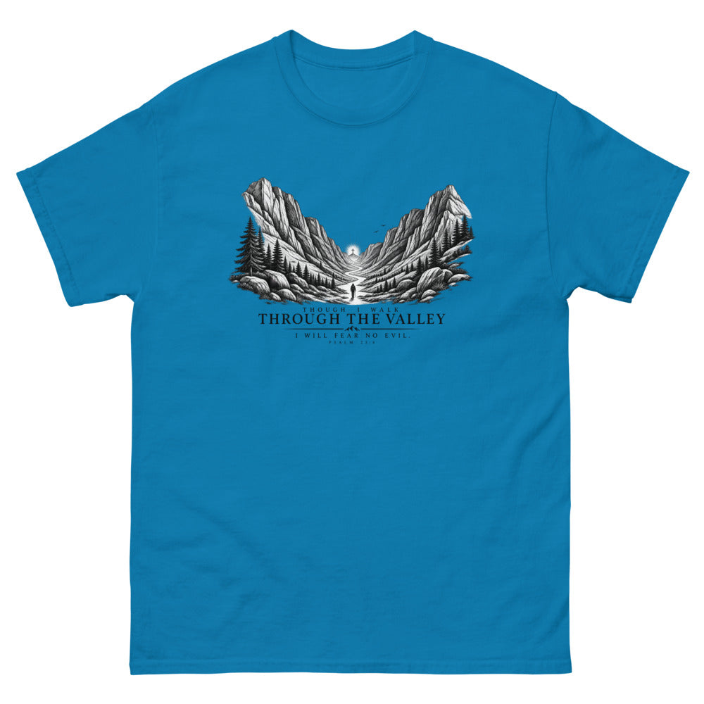 Engraved mountain valley with a lone figure reading Though I Walk Through The Valley I Will Fear No Evil on a Sapphire shirt