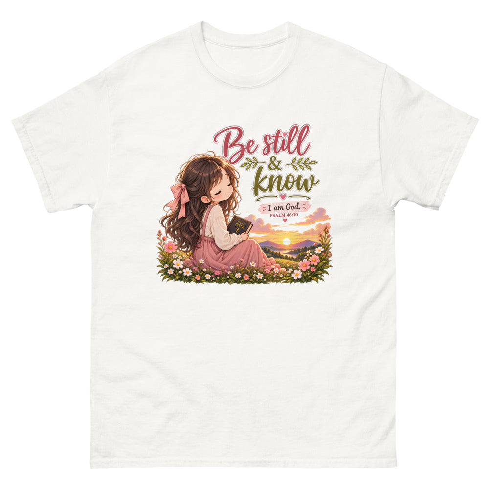 Chibi girl in a flower field holding a Bible with the words Be Still And Know