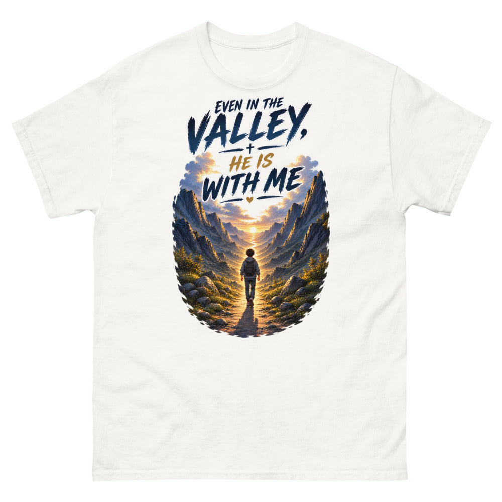 Hiker walking through a mountain valley with the words Even In The Valley He Is With Me